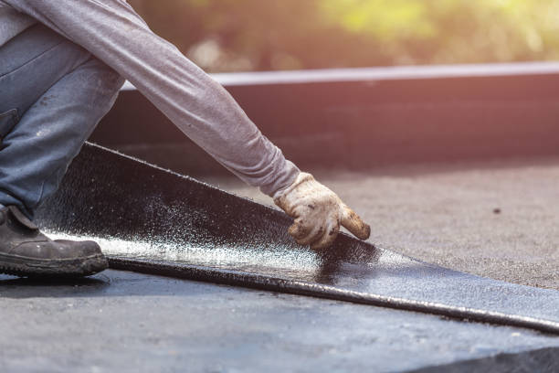 Professional Basement Waterproofing technician working in Russellville, TN